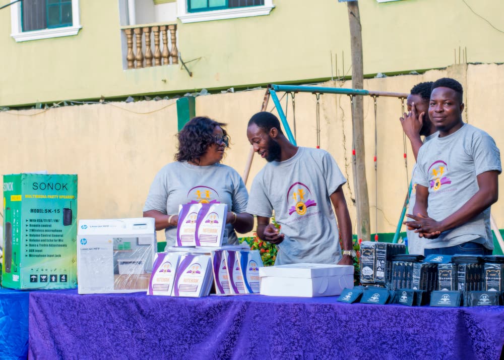 Children receiving school bags